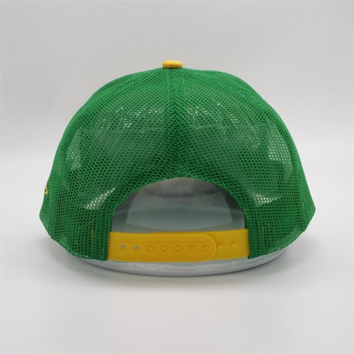 green baseball cap