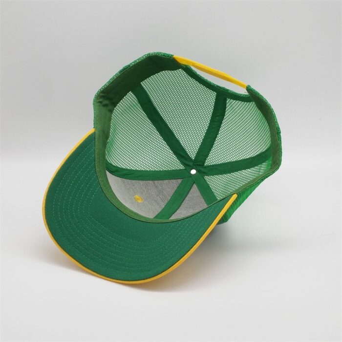 green baseball cap